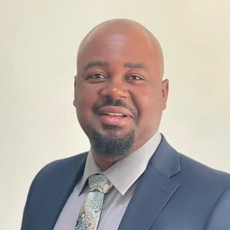 Headshot of Wiss Romain